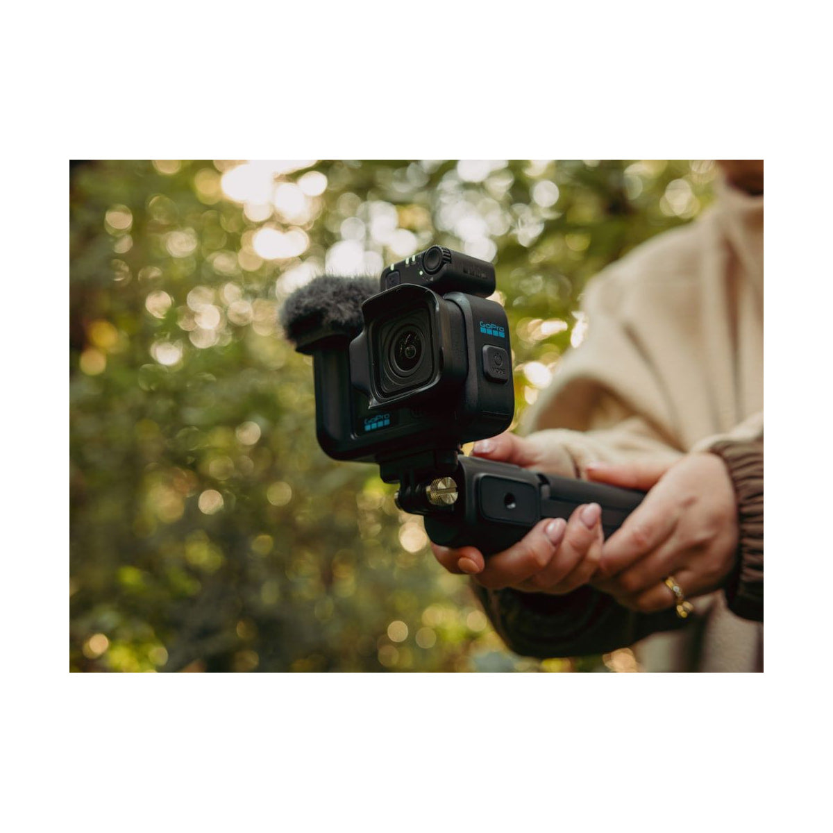 GoPro Mission 1 Pro Creator Edition Camera — creator edition camera front view on handheld grip 2 view