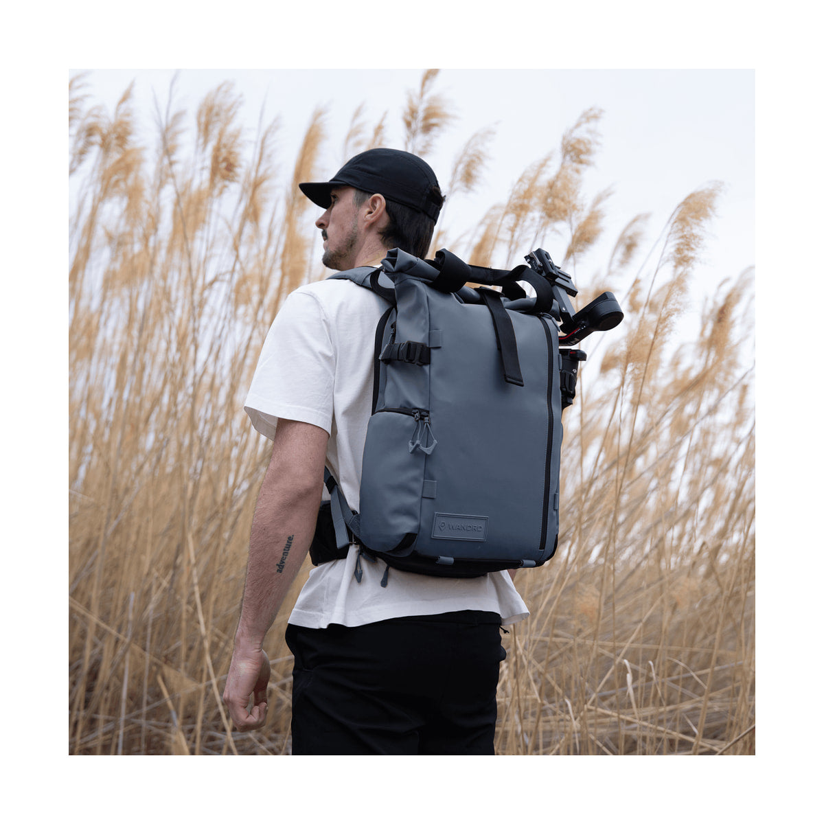 WANDRD PRVKE 21 V4 Backpack w/Photo Bundle (Aegean Blue) — rear lifestyle view with camera rig attached 2 view