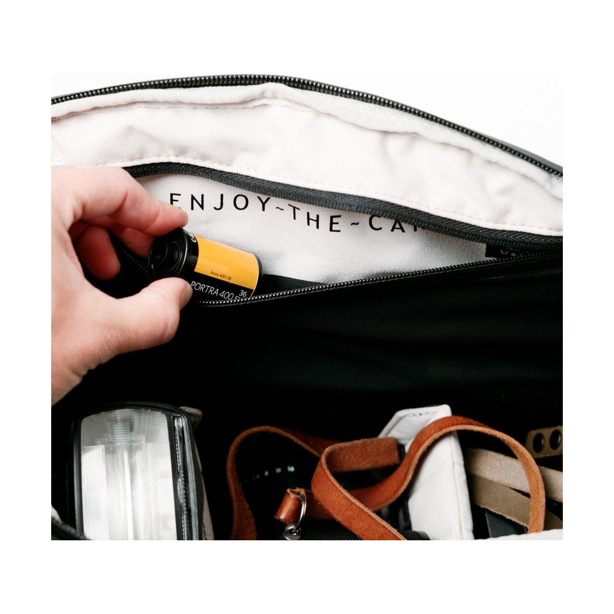 Clever Supply Camera Sling V2 Black — interior detail with film and camera gear view