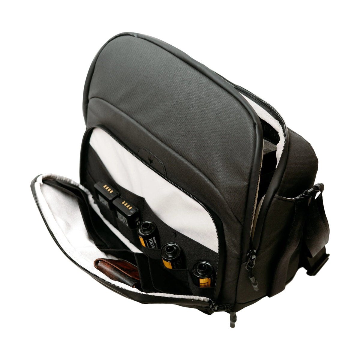 Clever Supply Camera Sling V2 Black — open compartment with film and camera view