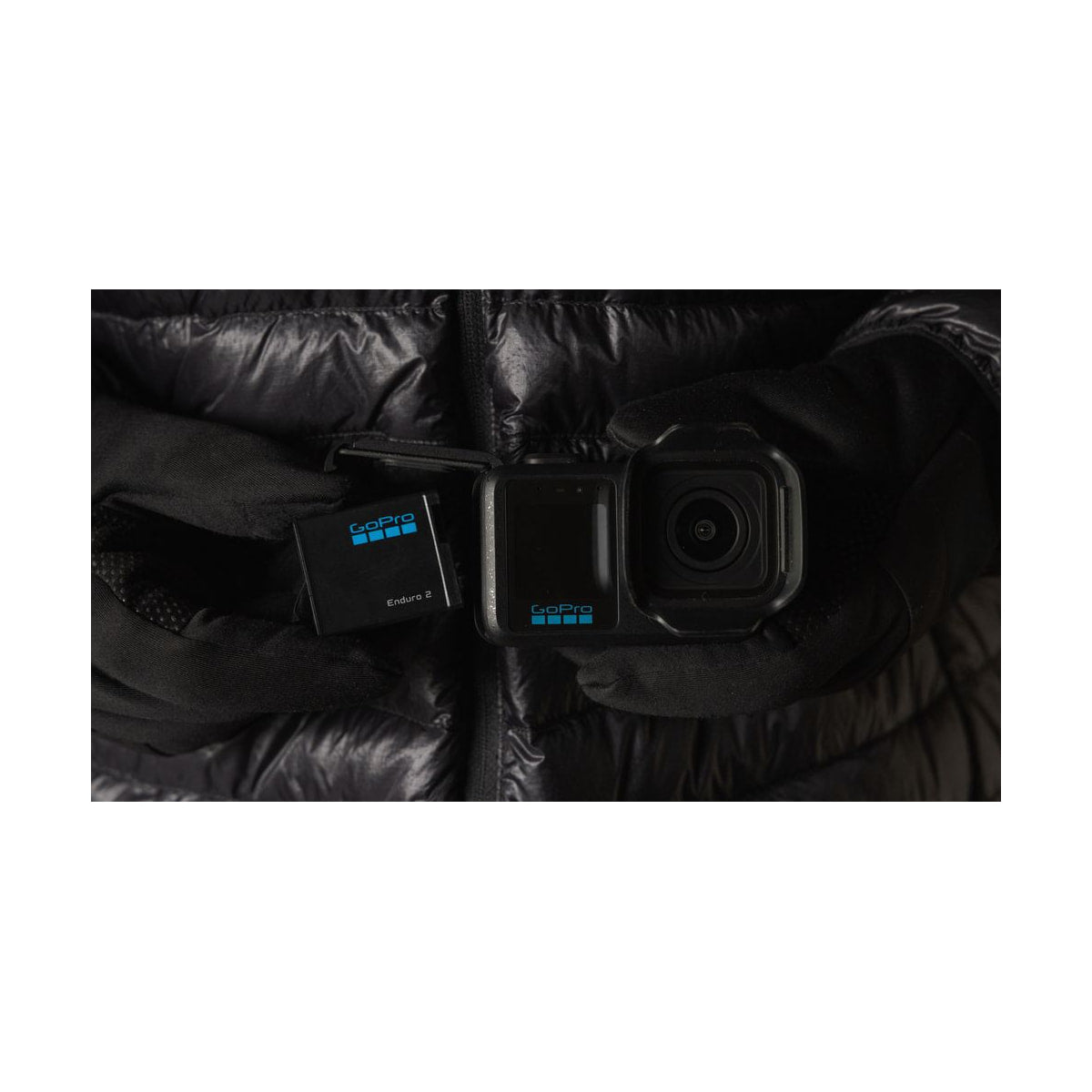 GoPro Enduro 2 Battery for Mission 1 Pro Cameras — battery beside mission 1 camera in bag view