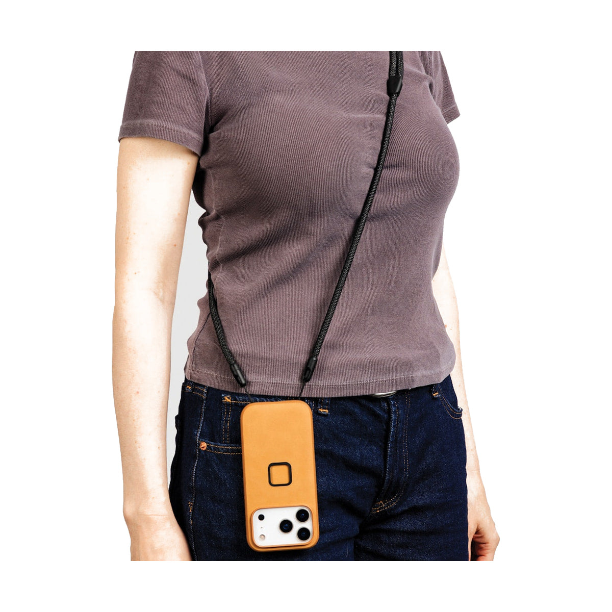 Peak Design Mobile Crossbody Strap (Black) — black strap worn with phone case view
