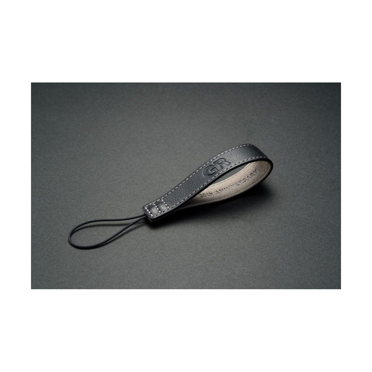 Ricoh GR IV 30th Anniversary Edition Kit — anniversary leather finger strap detail view