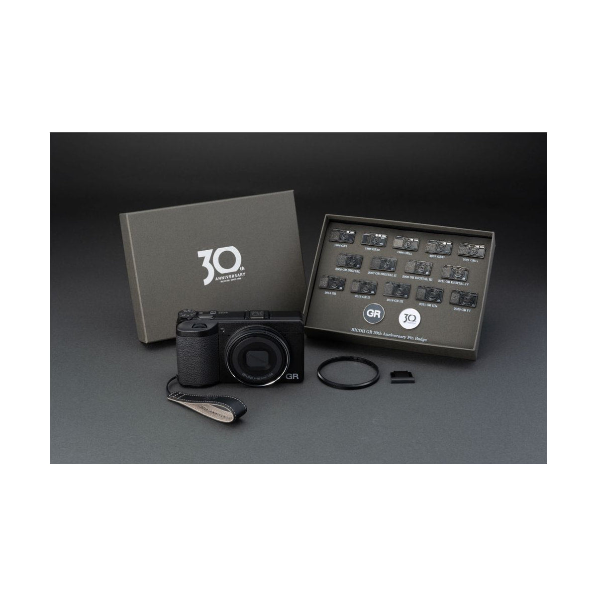 Ricoh GR IV 30th Anniversary Edition Kit — front view of camera with anniversary accessories view