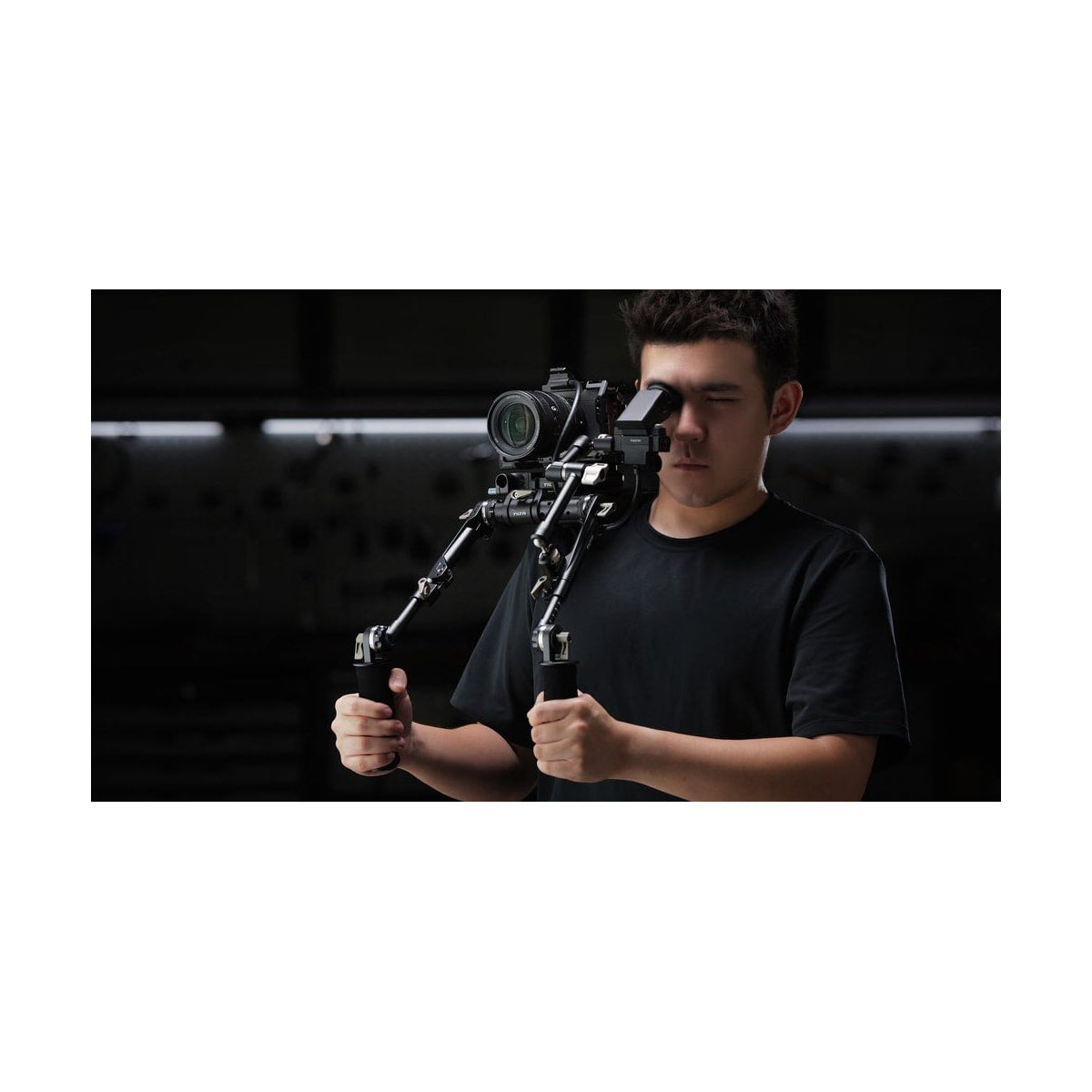 Tilta EVF Extension Kit for Sony FX5 — operator adjusting camera rig with evf kit view