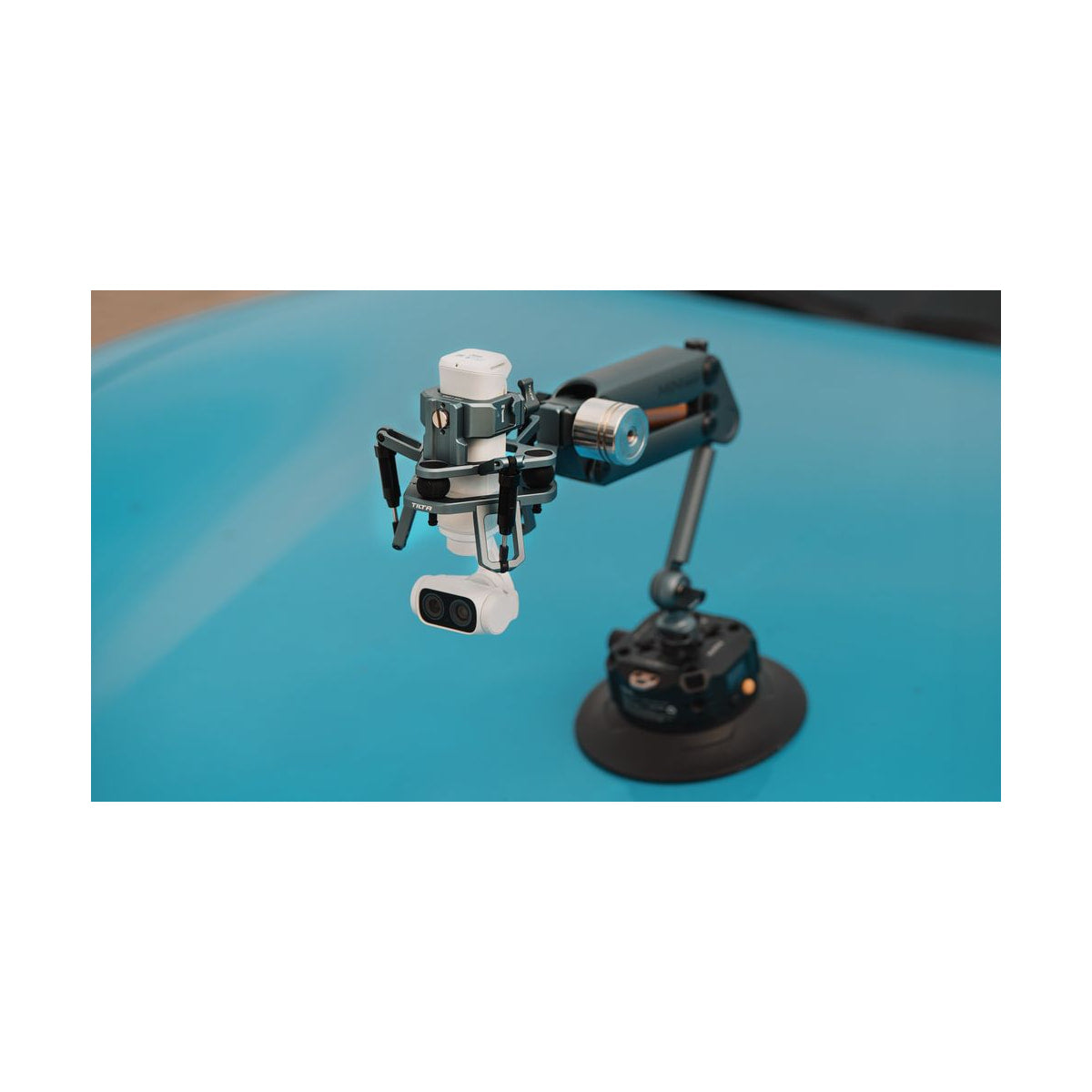 Tilta Shock-Absorbing Head for Hydra Alien Mini & Insta360 Luna Ultra — head supporting a camera beneath mounted arm view