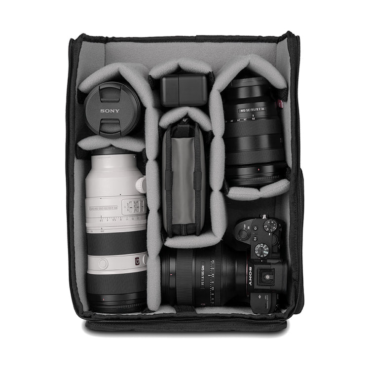 WANDRD PRVKE Camera Cube Pro (21L) — open interior packed with camera gear view
